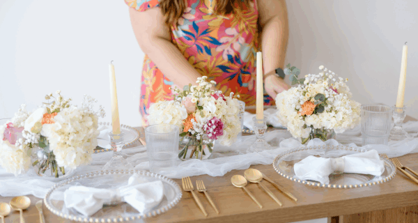Wedding Planner based in Columbia, SC setting up a tablescape